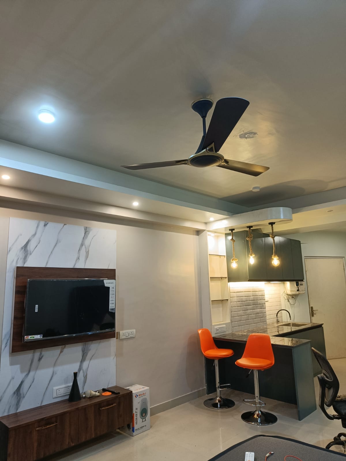Modern bedroom in serviced apartment New Town Kolkata with king-size bed and workspace - Xanadu Stays